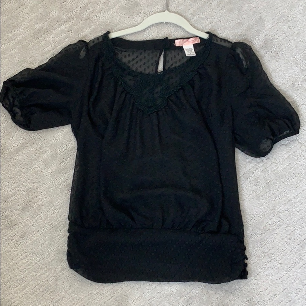 Francesca’s black polka dot top